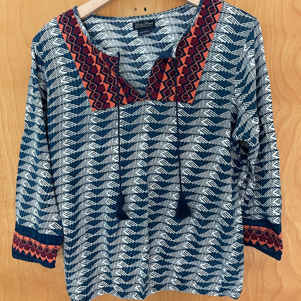 Adorable knit top by Lucky Brand. Loose fit. 3/4 sleeves.